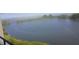 Expansive water view from a condo balcony, showcasing the natural beauty and tranquil setting of the location at 6009 Sea Ranch Dr # 101, Hudson, FL 34667