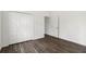 Bedroom with spacious closet and luxury vinyl plank flooring at 4160 Belladonna Ave, North Port, FL 34286