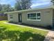 Charming house with updated landscaping and front door at 15008 Spokane Rd, Spring Hill, FL 34610
