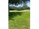 Expansive grassy front lawn, perfect for outdoor activities and enjoyment at 15008 Spokane Rd, Spring Hill, FL 34610