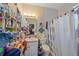 Modest bathroom with a vanity, toilet, and shower/tub combination at 18011 Prairie Wolf Gln, Parrish, FL 34219