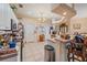 This kitchen features a ceiling fan and a breakfast bar at 18011 Prairie Wolf Gln, Parrish, FL 34219