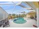 Inviting screened-in pool with a spa, perfect for relaxation and entertaining at 18011 Prairie Wolf Gln, Parrish, FL 34219