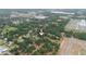 This property boasts a high-angle view revealing the home's placement in a neighborhood with greenery and easy access to highways at 2804 Robinson Rd, Plant City, FL 33565