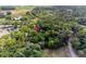 Aerial view of a wooded property highlighting its secluded and natural setting at 6005 Ike Smith Rd, Plant City, FL 33565
