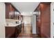 Modern kitchen features stainless steel appliances, ample cabinet space, and hardwood floors at 6005 Ike Smith Rd, Plant City, FL 33565