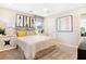 Comfortable bedroom with a ceiling fan, neutral walls, and a door leading to another room at 6014 Jensen View Ave, Apollo Beach, FL 33572