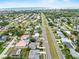 Stunning aerial view of the community, showcasing its proximity to the beach, and neighborhood streets at 14010 102Nd Ave, Largo, FL 33774