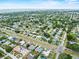Picturesque aerial view highlighting the neighborhood's lush greenery and convenient access to nearby amenities at 14010 102Nd Ave, Largo, FL 33774