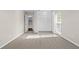 Bright bedroom with closet, neutral carpet, and walls, offering a simple but cozy space at 14010 102Nd Ave, Largo, FL 33774