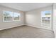 The bedroom has two nice windows and a closet at 14010 102Nd Ave, Largo, FL 33774
