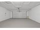 Spacious garage with epoxy flooring and automatic door at 14010 102Nd Ave, Largo, FL 33774