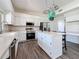 Charming kitchen includes modern appliances, an island, and convenient desk nook at 16219 Turnbury Oak Dr, Odessa, FL 33556