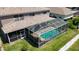 Screened in pool featuring crystal clear water, plenty of space to relax and enjoy the outdoors at 16219 Turnbury Oak Dr, Odessa, FL 33556