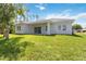 A beautiful backyard with large lawn at 4344 Jaslo Ave, North Port, FL 34286