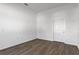Spacious bedroom featuring modern wood-look flooring and a large closet at 4344 Jaslo Ave, North Port, FL 34286
