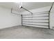 Empty garage with concrete floors at 4344 Jaslo Ave, North Port, FL 34286