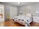 Bright bedroom with hardwood floors, closet, and neutral decor at 219 S Mcmullen Booth Rd # 175, Clearwater, FL 33759