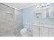 Updated bathroom featuring white marble shower, glass door, and white vanity at 3728 19Th E St, Bradenton, FL 34208