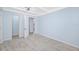 Bright bedroom featuring blue walls, tile floors, recessed lighting, and a ceiling fan at 3728 19Th E St, Bradenton, FL 34208