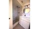 Updated bathroom featuring modern fixtures, stylish shower and a new vanity at 10336 Oak Hill Dr, Port Richey, FL 34668