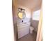 Updated bathroom featuring modern fixtures, stylish mirror and a new vanity at 10336 Oak Hill Dr, Port Richey, FL 34668