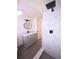 Bathroom featuring a walk-in shower, modern fixtures and updated vanity at 10336 Oak Hill Dr, Port Richey, FL 34668