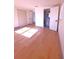 Bright bedroom with hardwood floors, and a closet, providing ample space and storage at 10336 Oak Hill Dr, Port Richey, FL 34668