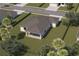 Aerial view of a house with an outdoor sitting area in the back at 4146 New Milford St, North Port, FL 34288