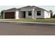 New construction exterior with a modern design, showcasing clean lines and neutral tones at 4146 New Milford St, North Port, FL 34288