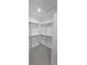 Well-organized walk-in closet featuring ample shelving and storage options to maximize space at 4146 New Milford St, North Port, FL 34288