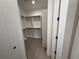 Spacious walk-in closet providing ample room and organization for clothing and accessories at 4146 New Milford St, North Port, FL 34288