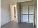 Bedroom featuring closet with sliding doors at 4098 New Milford St, North Port, FL 34288