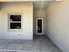 Inviting entryway with tiled floor and ample natural light at 4098 New Milford St, North Port, FL 34288