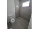 Modern bathroom with a tiled walk-in shower at 4098 New Milford St, North Port, FL 34288