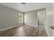 Bedroom featuring laminate flooring and bright natural light at 19713 Ellendale Dr, Land O Lakes, FL 34638