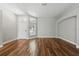 Bright living room with hardwood floors, neutral paint, and natural light at 19713 Ellendale Dr, Land O Lakes, FL 34638