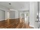 Spacious living room with hardwood floors and neutral paint at 19713 Ellendale Dr, Land O Lakes, FL 34638
