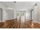 Expansive living room featuring hardwood floors and neutral color palette at 19713 Ellendale Dr, Land O Lakes, FL 34638