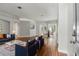 Living room with hardwood floors, neutral paint, and modern furniture at 19713 Ellendale Dr, Land O Lakes, FL 34638