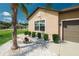 Exterior view of the home featuring manicured landscaping and a well-maintained facade at 13475 Crest Lake Dr, Hudson, FL 34669