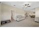 Spacious living room showcases an open layout and tiled flooring at 13475 Crest Lake Dr, Hudson, FL 34669
