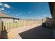 Paver patio with privacy fence offering a cozy outdoor space at 13475 Crest Lake Dr, Hudson, FL 34669