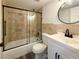 Bathroom featuring updated tile shower, modern vanity, and new fixtures at 1799 N Highland Ave # 143, Clearwater, FL 33755