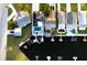 An aerial view captures the waterfront home with a pool and dock, next to neighboring houses at 5036 Bonito Dr, New Port Richey, FL 34652