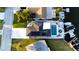 Aerial view of a luxury waterfront home with a backyard pool, patio and dock access at 5036 Bonito Dr, New Port Richey, FL 34652