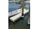 A waterfront dock features aluminum railings and supports at 5036 Bonito Dr, New Port Richey, FL 34652