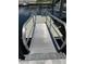 A waterfront dock features a ladder to access the water at 5036 Bonito Dr, New Port Richey, FL 34652