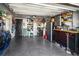 Spacious garage with organized storage, epoxy flooring, and ample room for parking and projects at 5036 Bonito Dr, New Port Richey, FL 34652