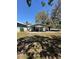 Spacious backyard with a covered patio, perfect for outdoor entertaining and enjoying the peaceful surroundings at 8702 El Portal Dr, Tampa, FL 33604